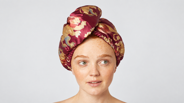 Showcasing Kitsch x Harry Potter Satin Wrapped Hair Towel in Gryffindor by KITSCH