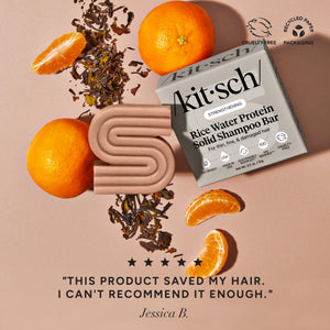 KITSCH Anti-Shedding Hair Essentials Bundle — review-style infographic — Rice Water Shampoo Bar with five-star customer review, styled with oranges and tea leaves — clinically proven to boost hair volume by 20% in 5 washes