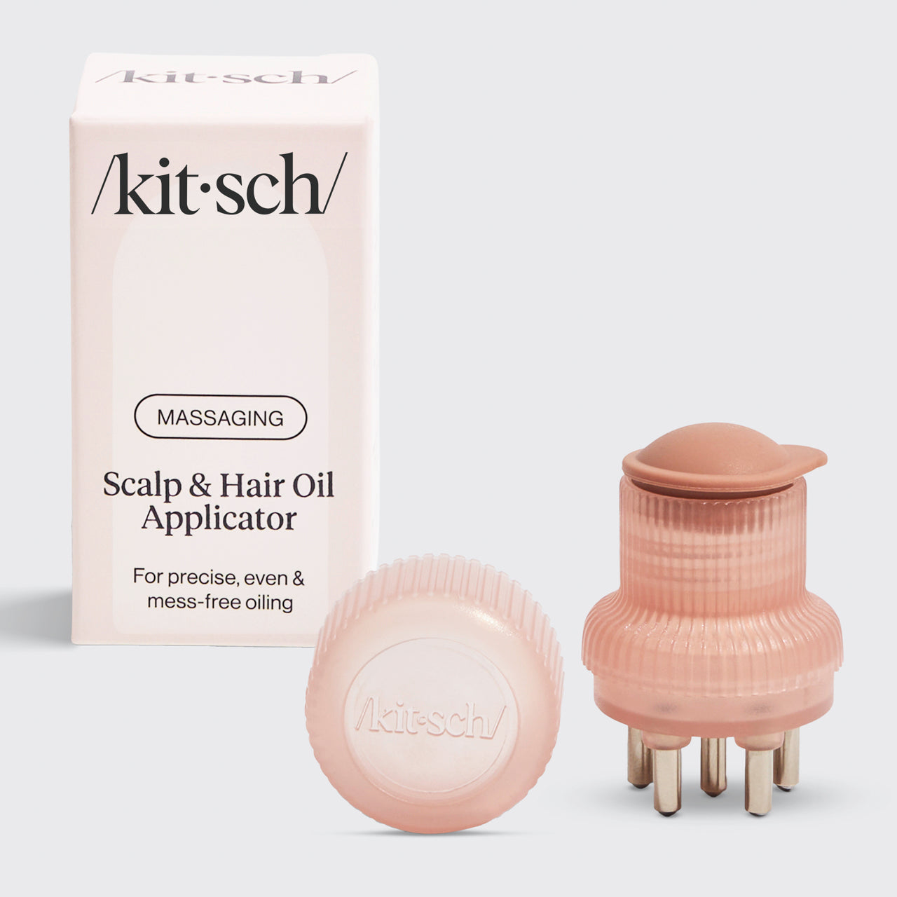 Applicatore di olio per il cuoio capelluto