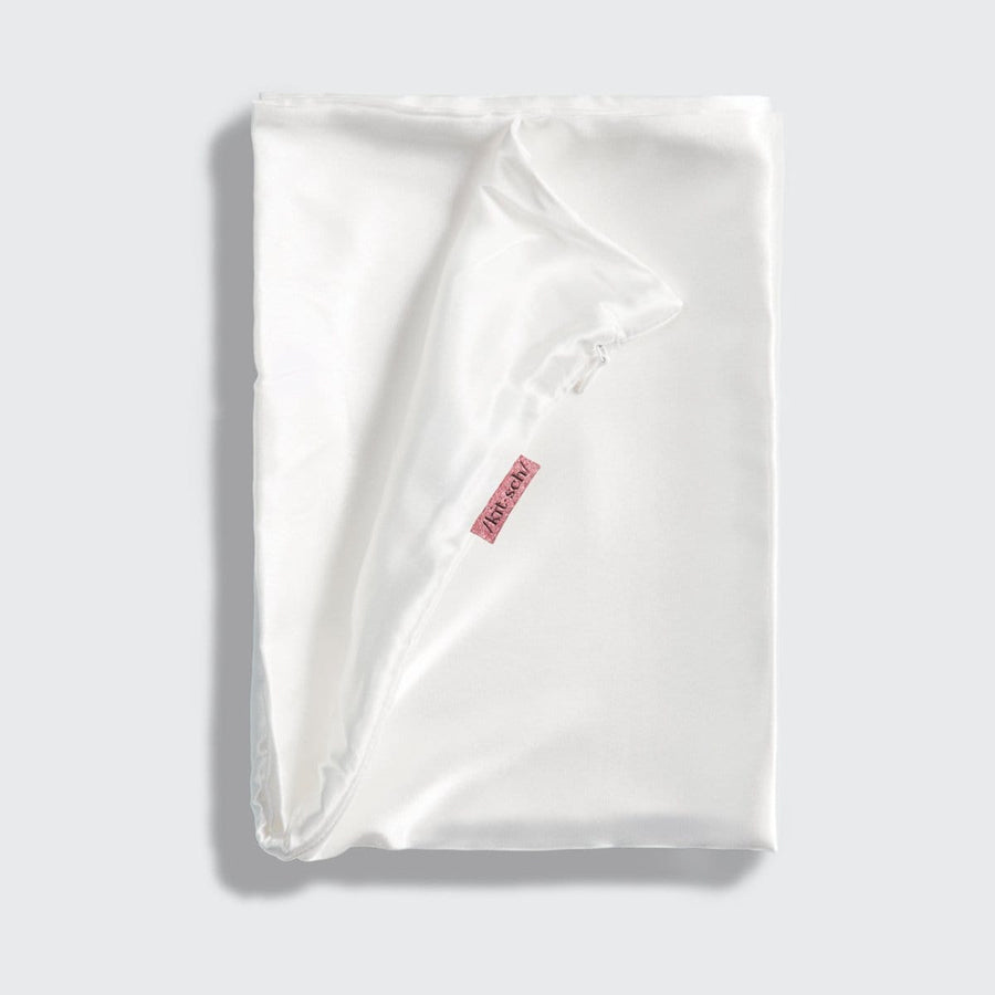 KITSCH Ivory Standard Satin Pillowcase — styled bedroom scene